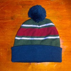 navy blue and green striped winter puffbal…